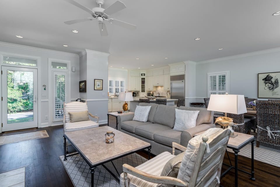 Open floor plan with kitchen, living room, dining room and sunroom!  High ceilings, high-end furnishings!