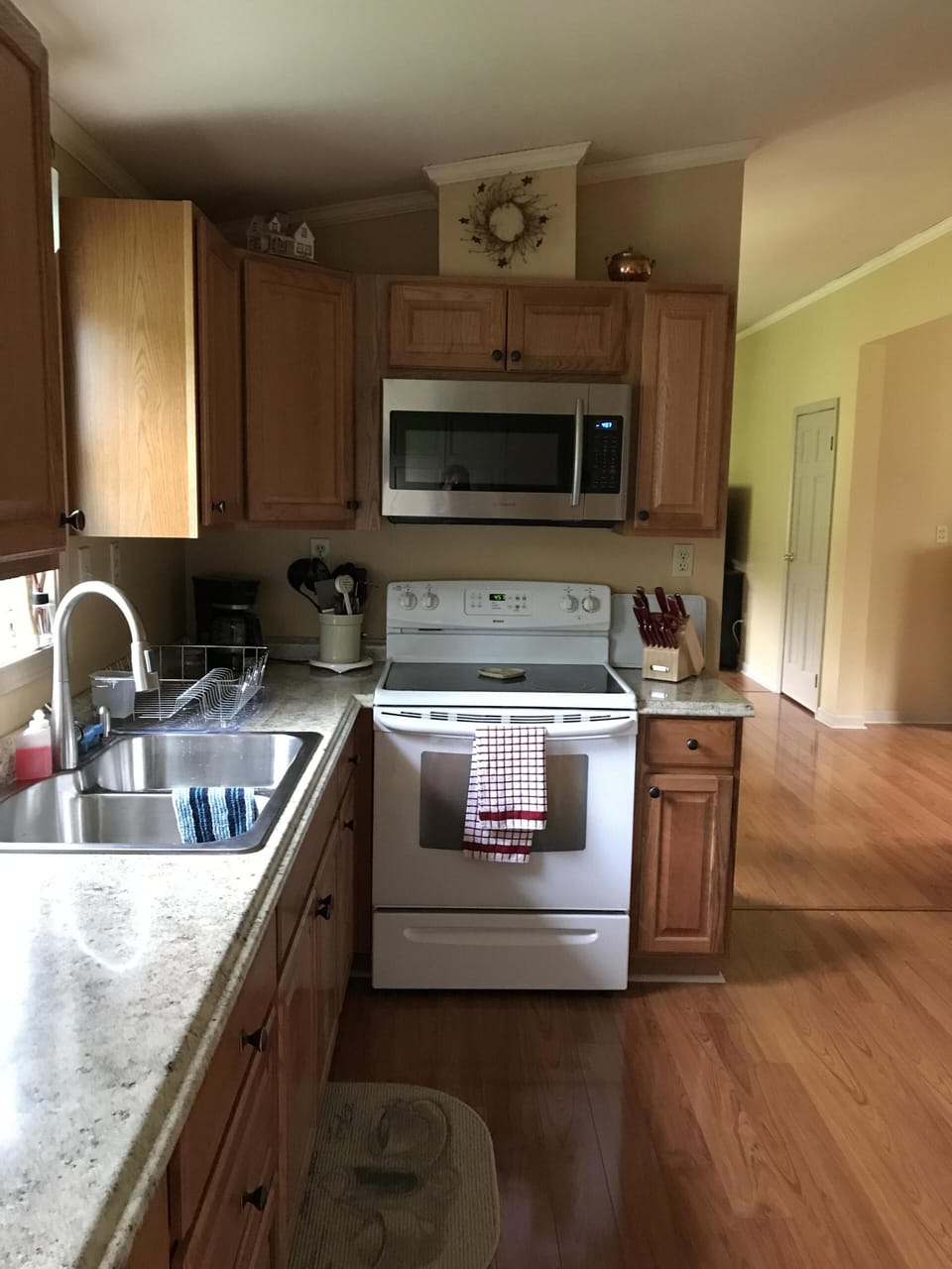Kitchen - updated 2018 w/new countertop, deep sink & built in microwave. 