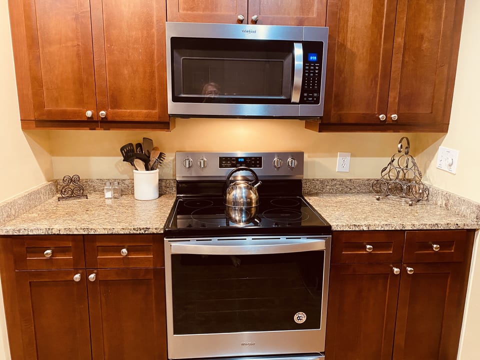 New Whirlpool stove and microwave.