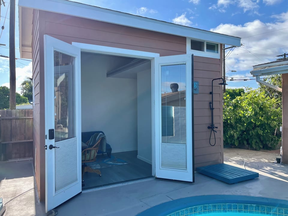 Newly finished pool house w office/workstation.
