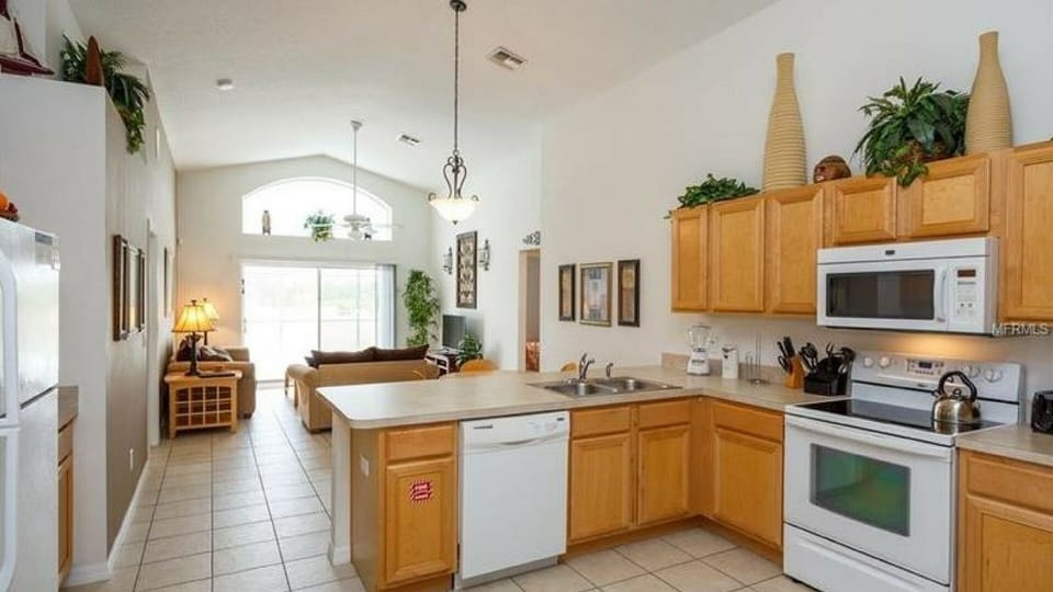 Large, bright well equipped kitchen.