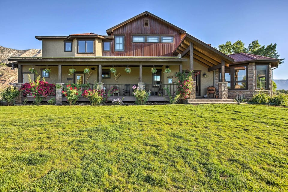 Escape to this oasis on the river to stay at this vacation rental house!