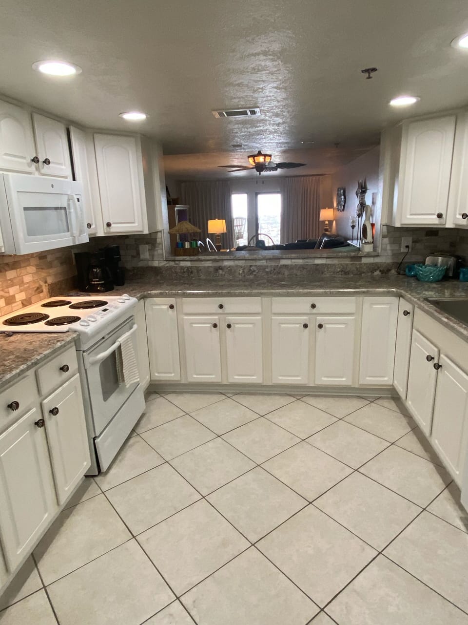 New Granite Countertops in Fully Stocked Kitchen 