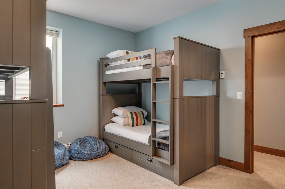 Hotel-style luxury linens in the bunk room