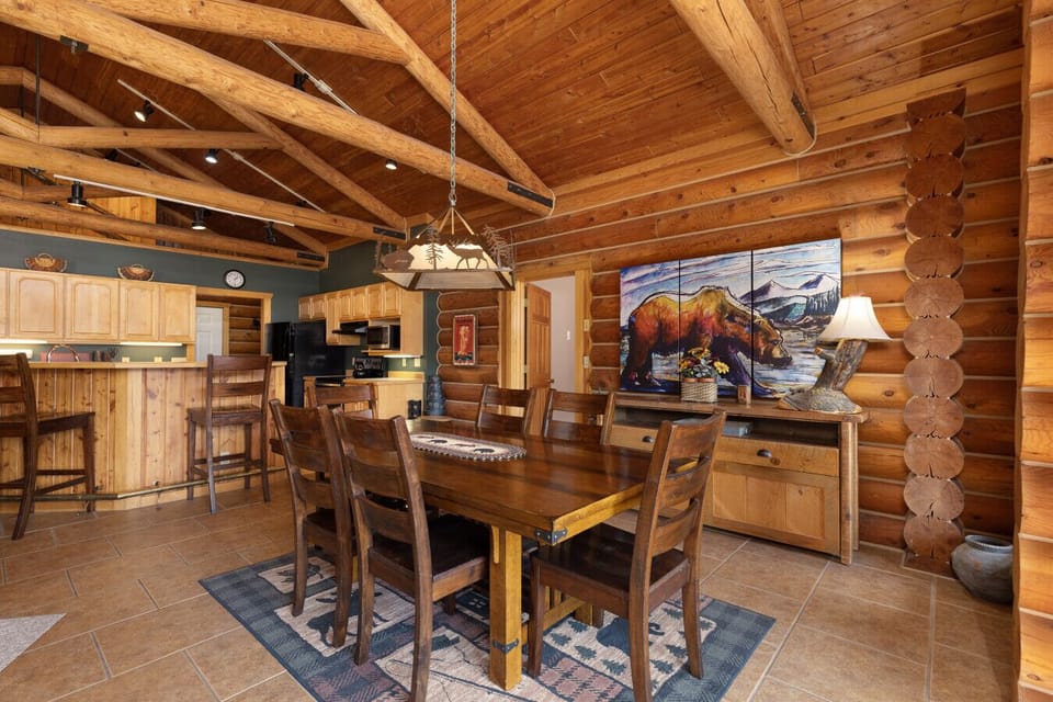Beautiful dining area with seating up to 6 people with additional seating off the kitchen, bar stools.