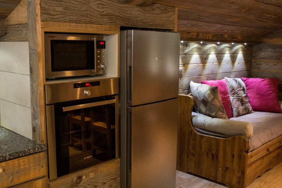 Cuisine ouverte sur séjour appartement location été hiver montagne La Bresse Vosges