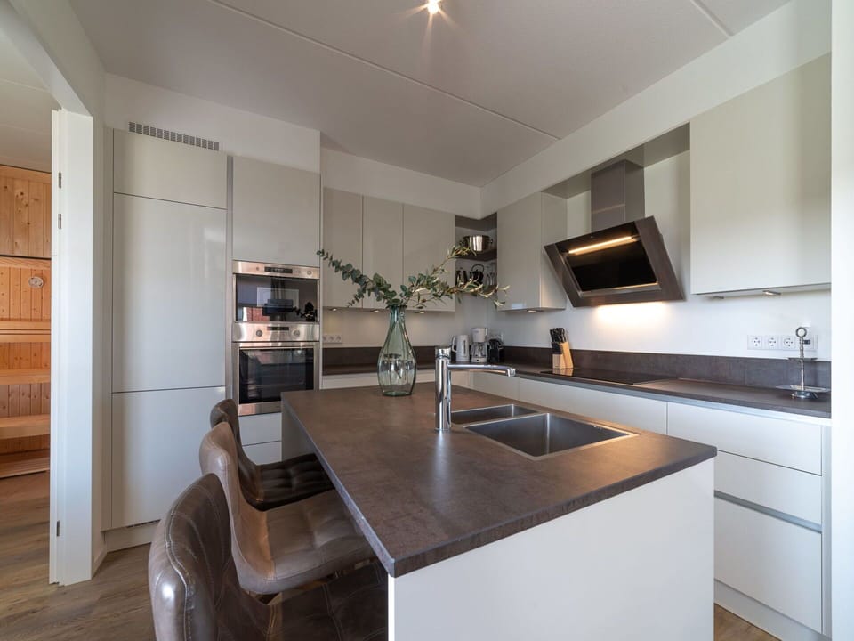 Countertop, Property, Cabinetry, Kitchen Stove, Kitchen, Wood, Home Appliance, Interior Design, Kitchen Appliance, Floor