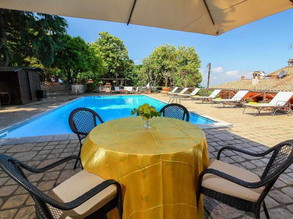 Property, Vacation, Resort, Yellow, Table, Real Estate, Shade, Leisure, Umbrella, Furniture