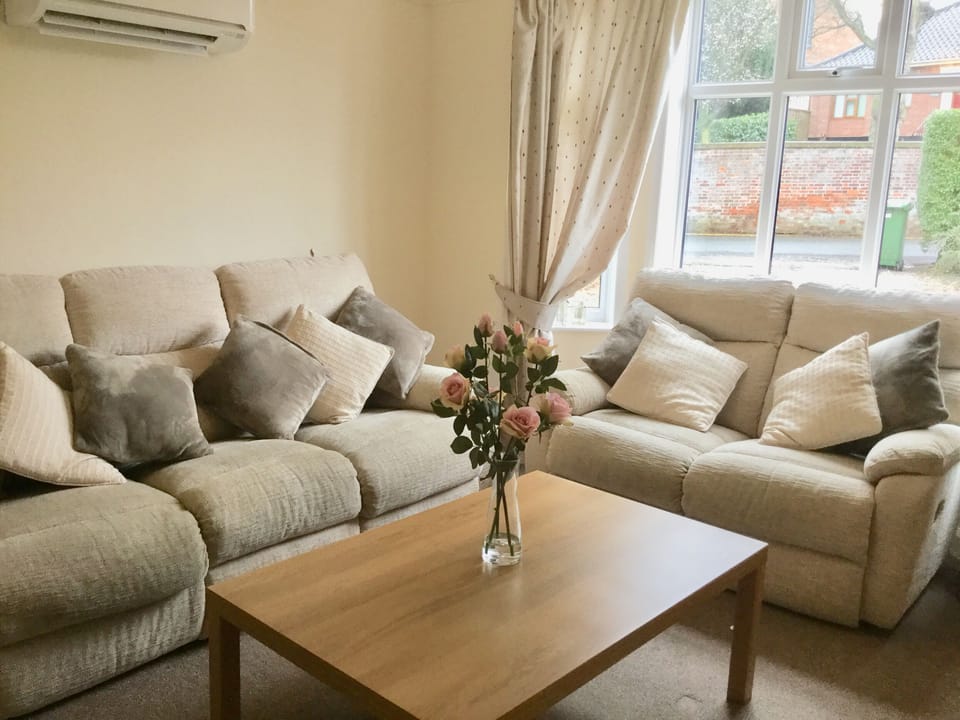 Lounge area looking out over carpark & driveway
