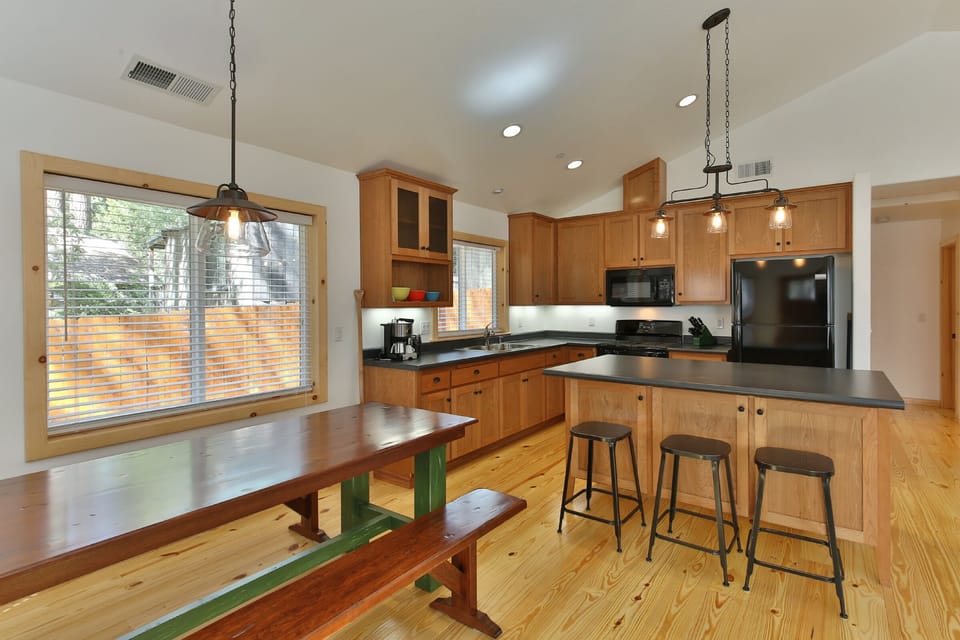 beautiful kitchen with large center island and plenty of seating