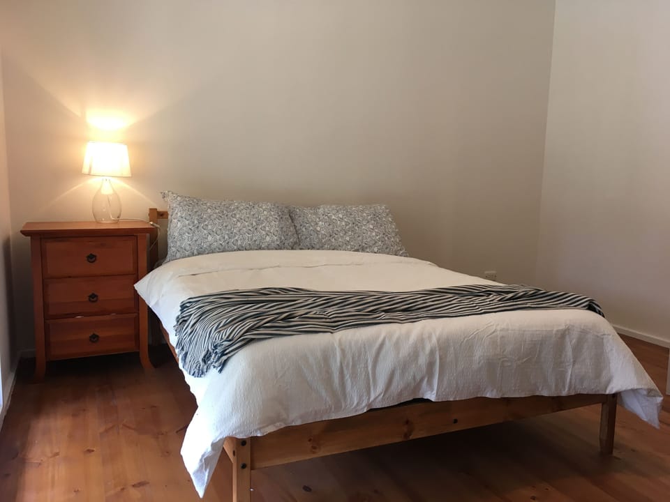 The double bedroom. It has a cupboard with hanging space for your clothes.