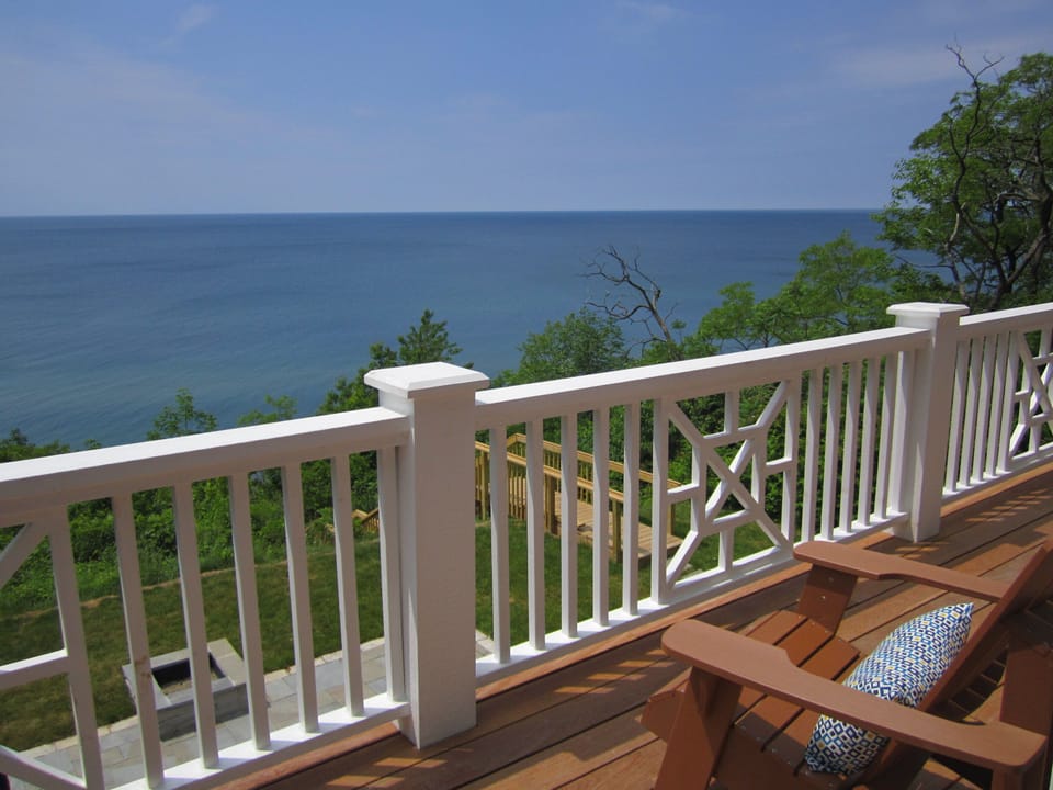 Relax at the Lake from Adirondack Chairs Lining Second Floor Balcony