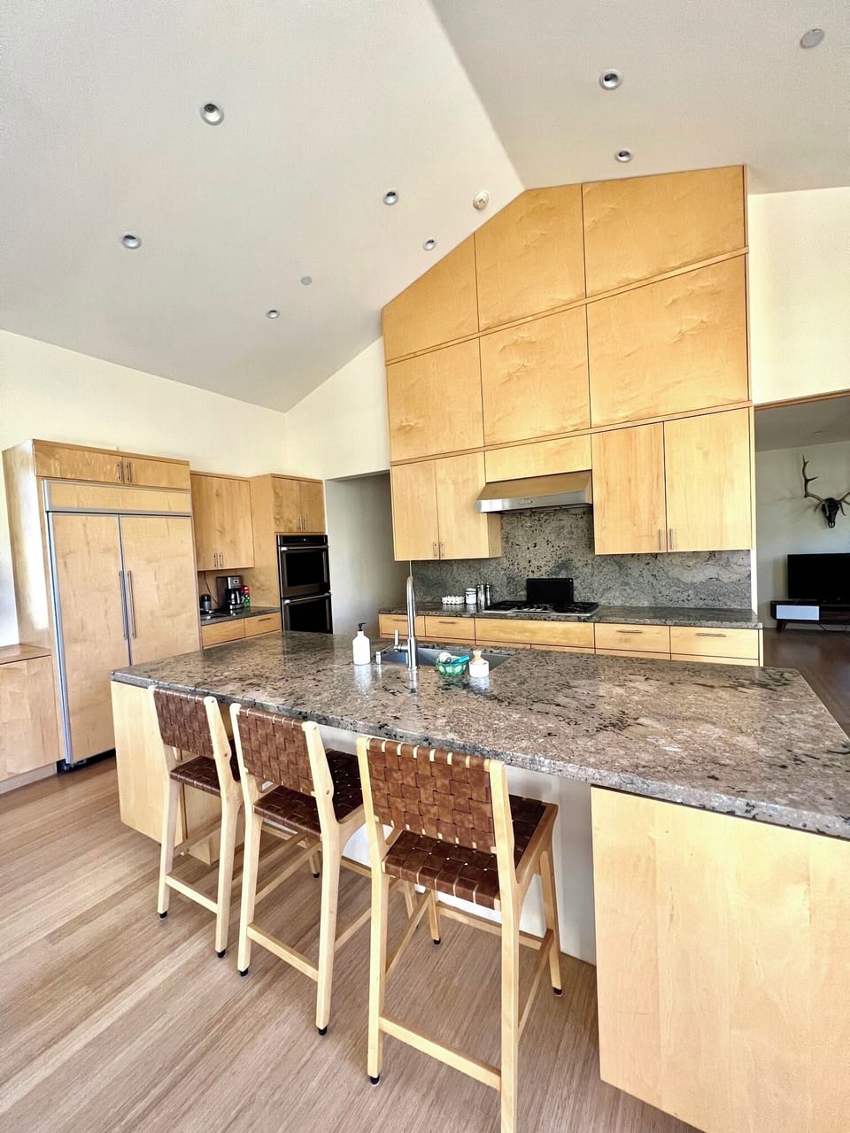 Fully stocked kitchen with bar seating
