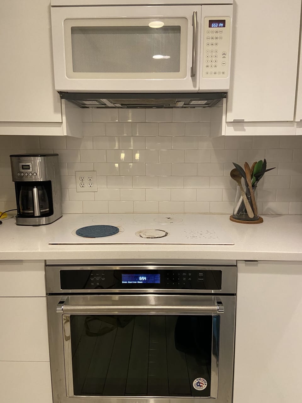 Kitchen has recently purchased oven, fridge, and dishwasher. 
