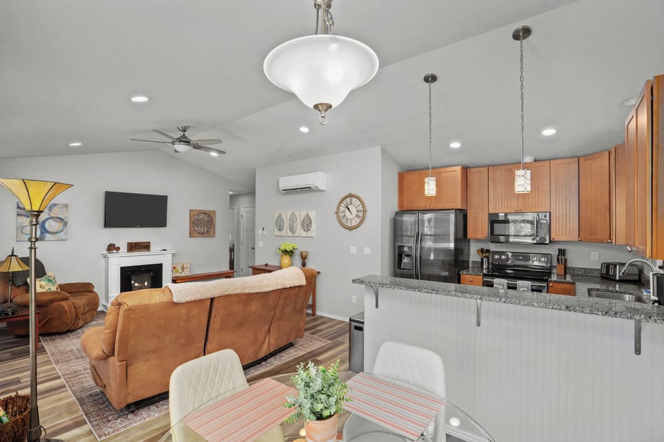 Upper Level Living Area, Kitchen and Dining Table