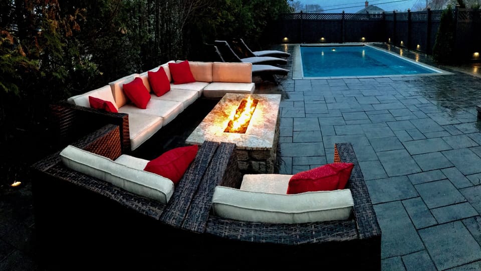 Night lights around pool and fire pit