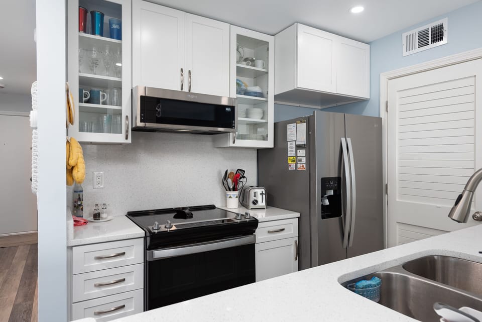 Well equipped kitchen with stainless steel appliances