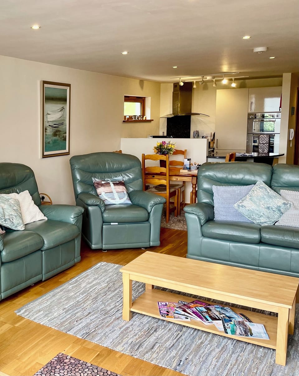 Open plan lounge ,dining area & full sized kitchen.
