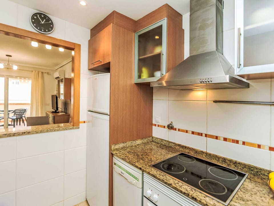Kitchen, Countertop, Major Appliance, Interior Design, Flooring, Wood, Kitchen Appliance, Floor, Cabinetry, Ceiling
