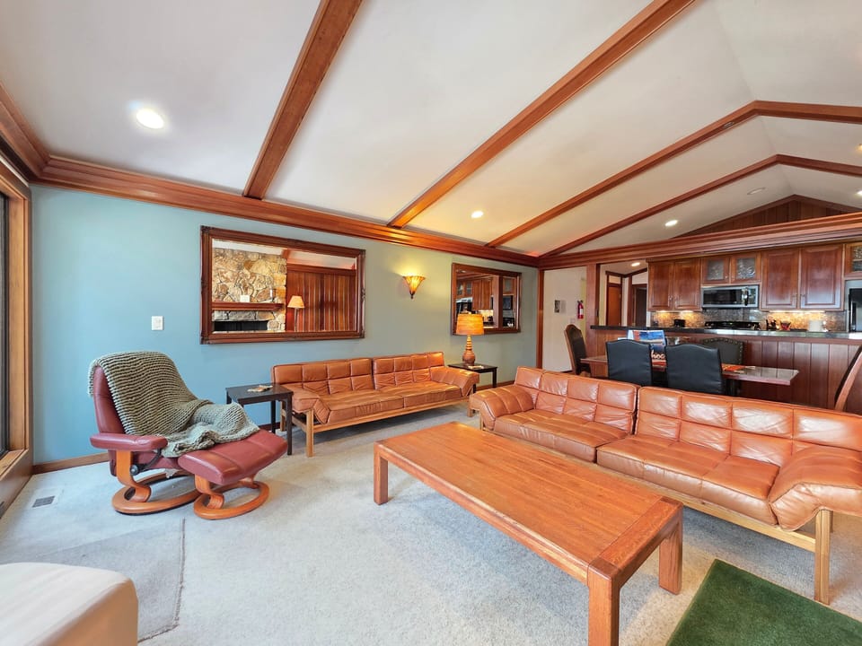 Second Floor- Living Room with lake view and deck