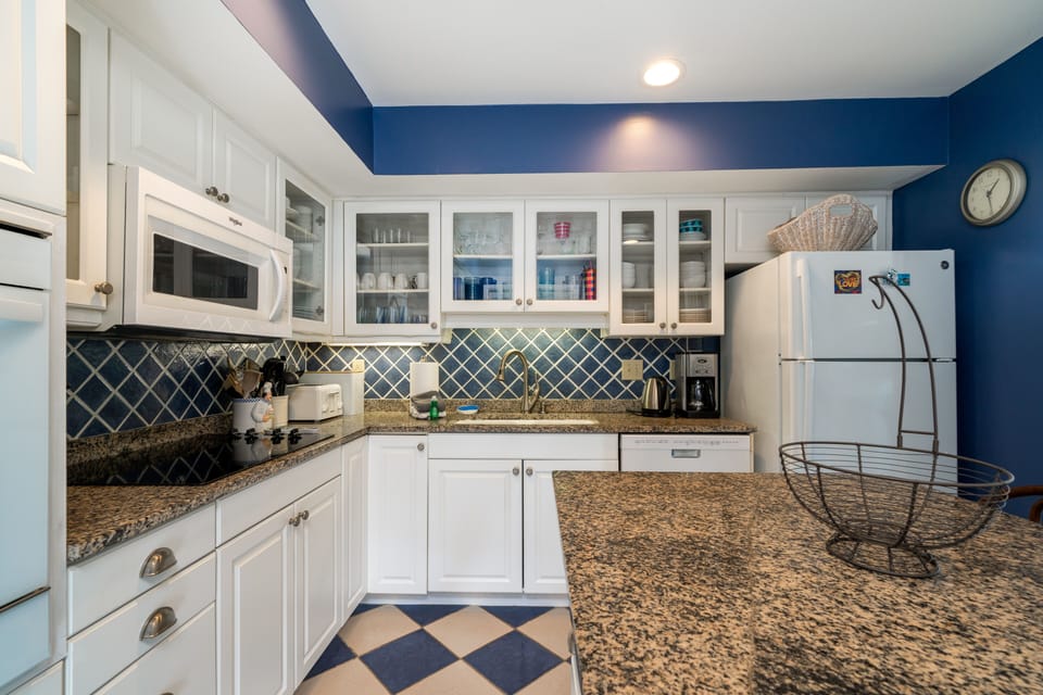 The kitchen is off the dining area and has an island makes it easy to gather.