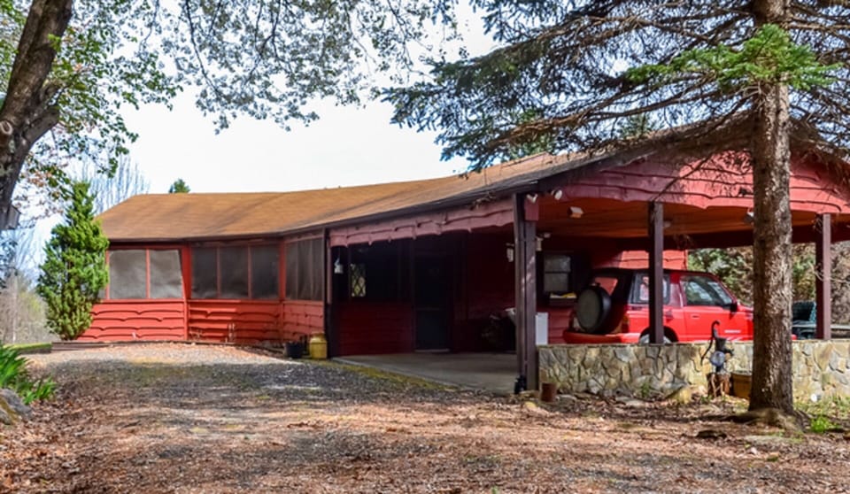 Back porch and carport from driveway.