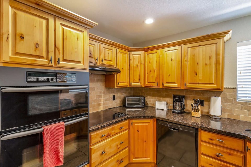 Stay in and cook your meals. You will enjoy this kitchen