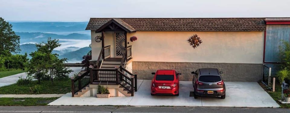 Plenty of parking by the front door, or in the driveway.