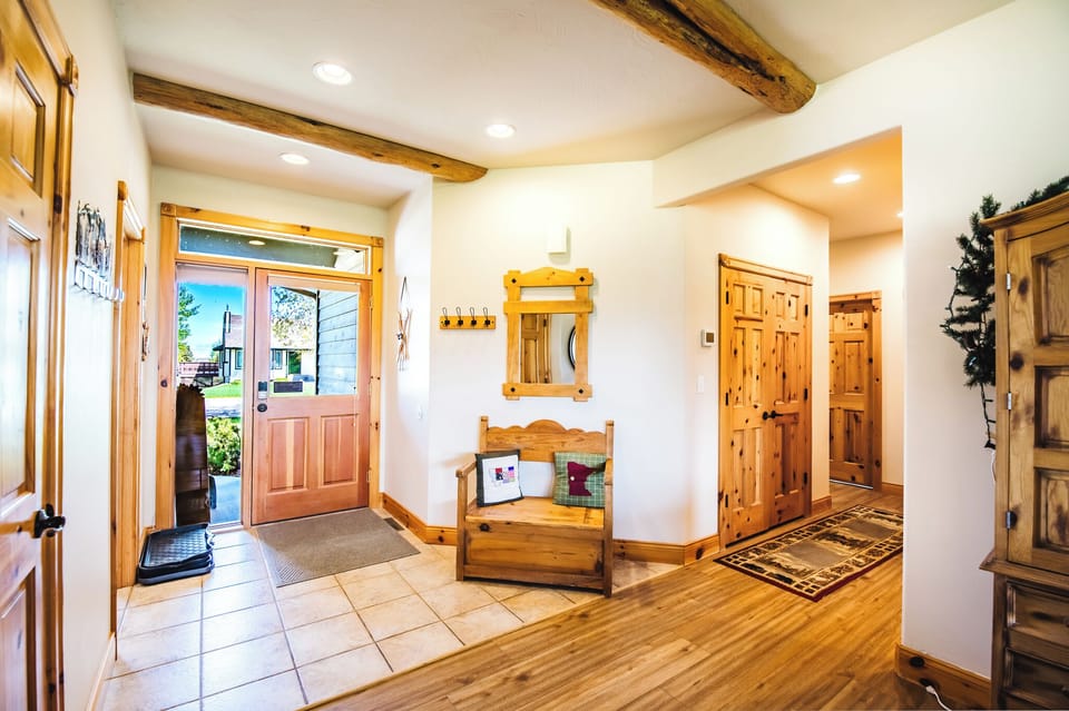 Light and bright front entry area is welcoming.