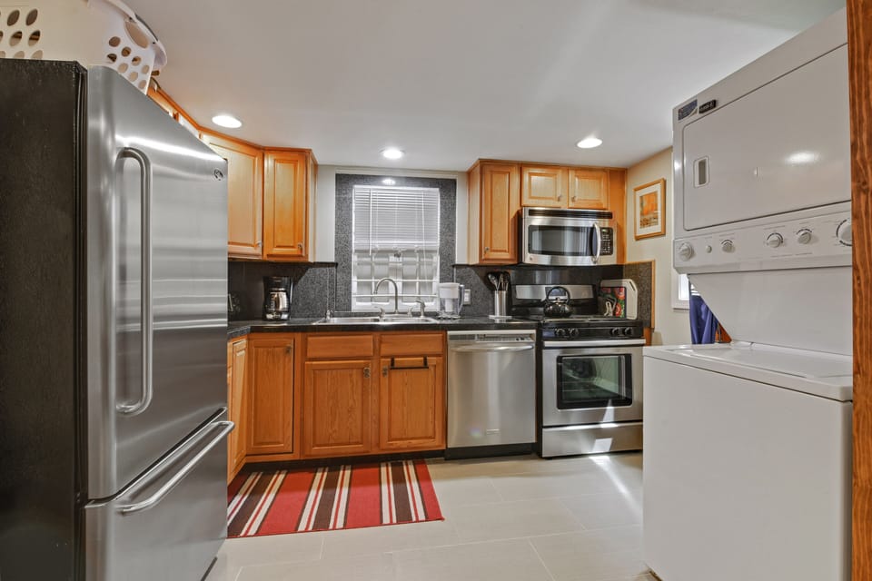 FULL KITCHEN WITH ALL NECESSARY EQUIPMENT 