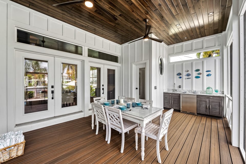 Enjoy open-air dinners in the screened porch.