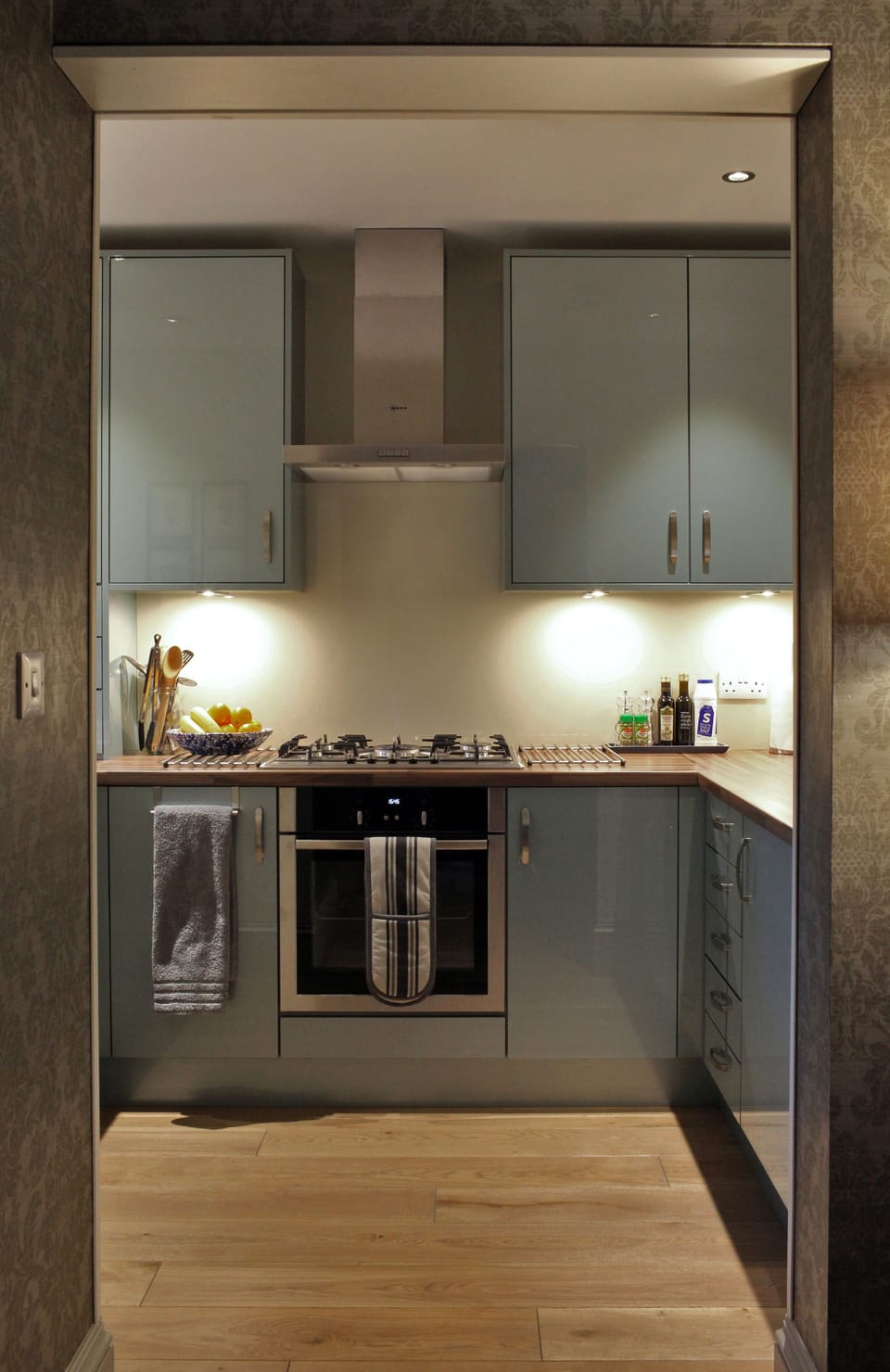 Kitchen:  sleek, fully-equipped and always in-touch with the rest of the flat.