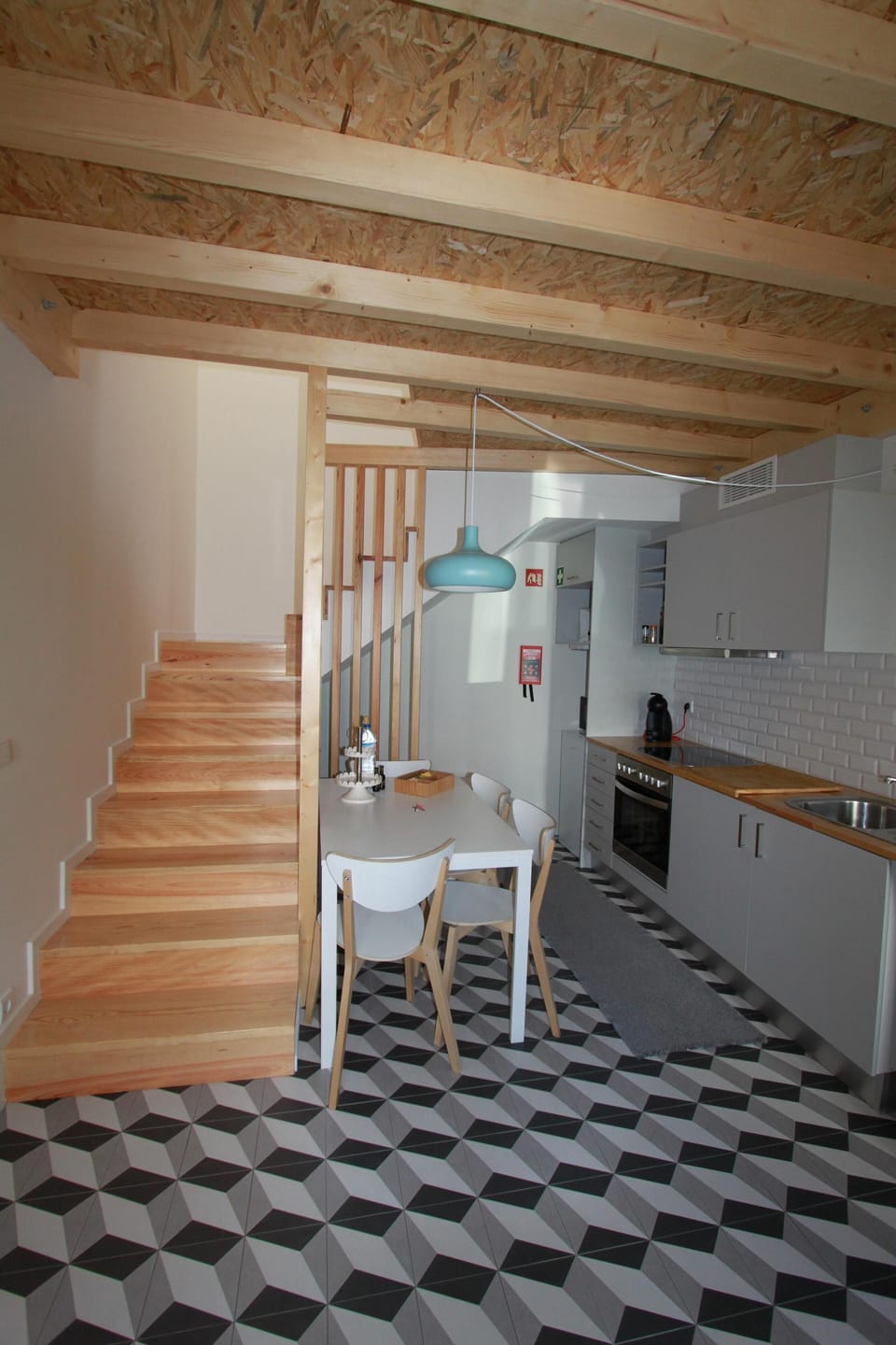 Kitchen and acess stairs to first floor