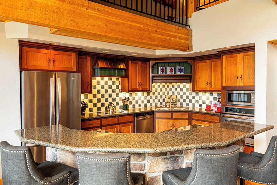 Fully equipped kitchen and a center island with seating for 4
