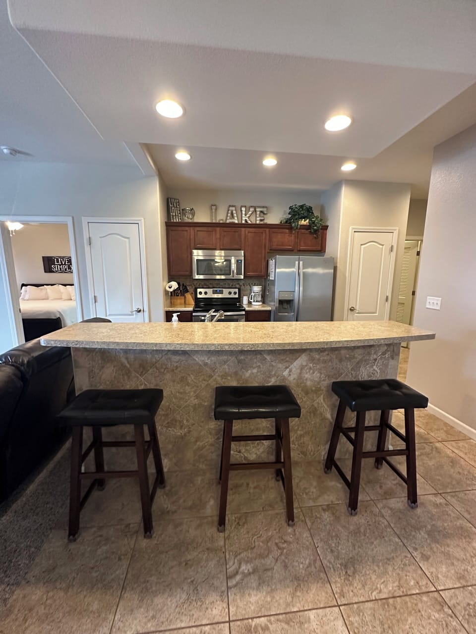 Kitchen with 3 bar stools