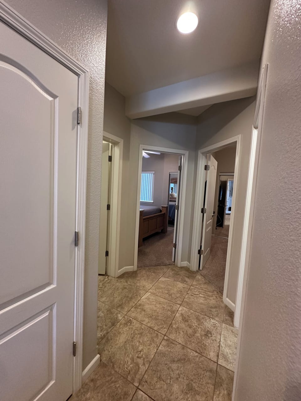 Hallway from kitchen to Bedroom 2 & 3, bathroom and laundry room