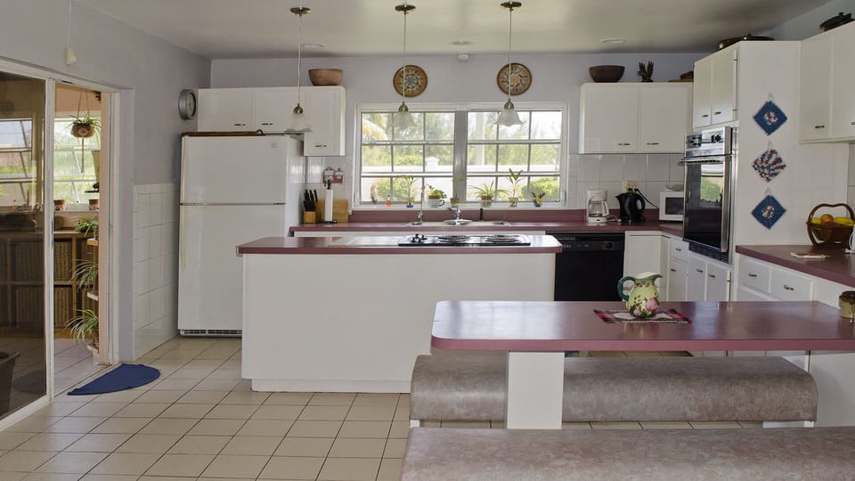 The kitchen opens up to the spacious living room.