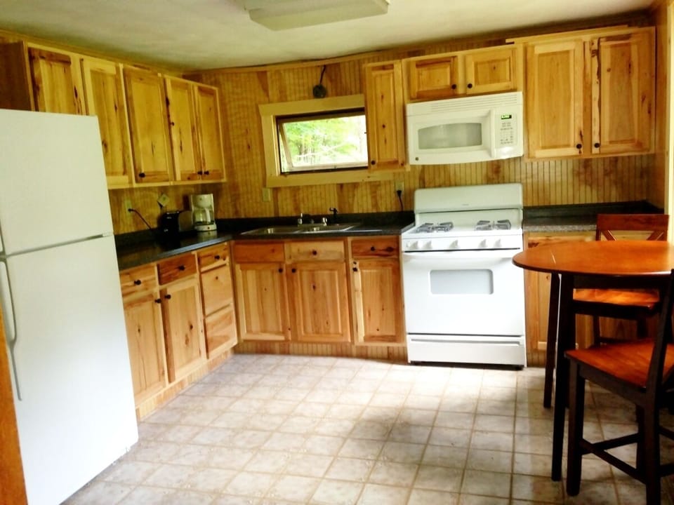 Kitchen- fully equipped ( plates, bowls, utensils, coffee pot, pots, pans)