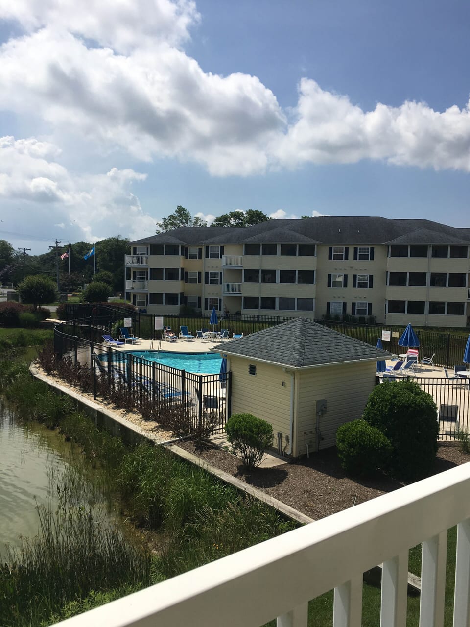 The second porch offers a dual sided view of the outdoor pool. 