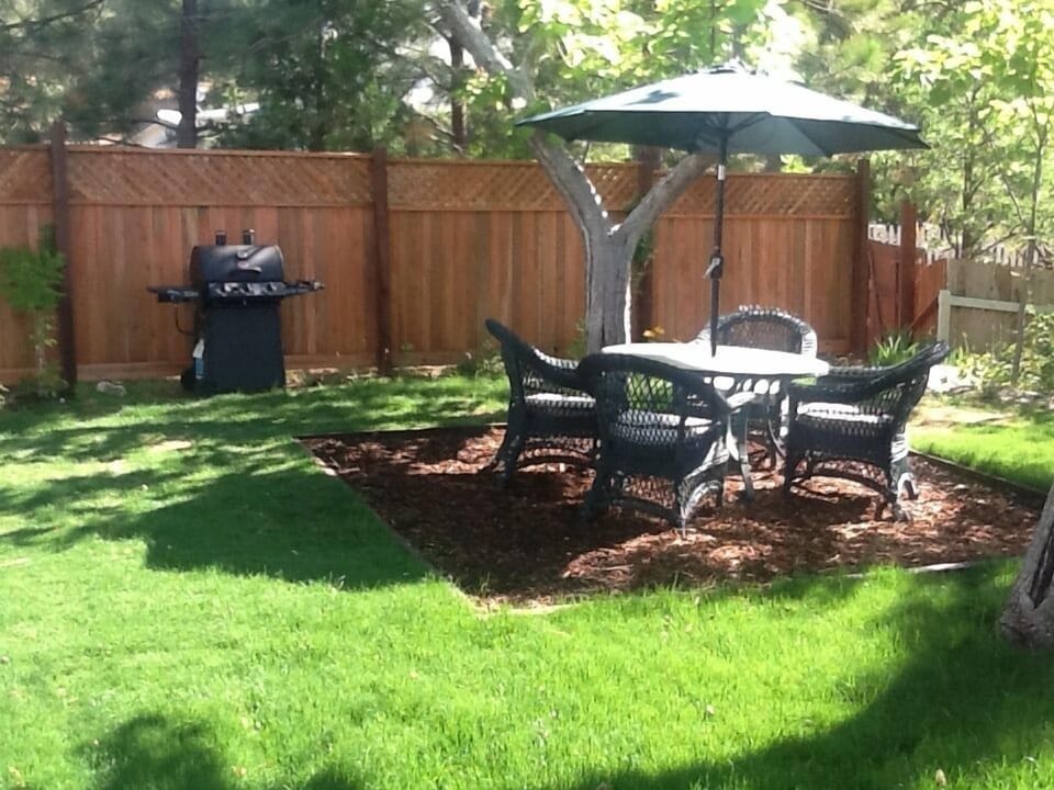 Enjoy relaxing in the shady, private front yard with gas barbeque & sitting area