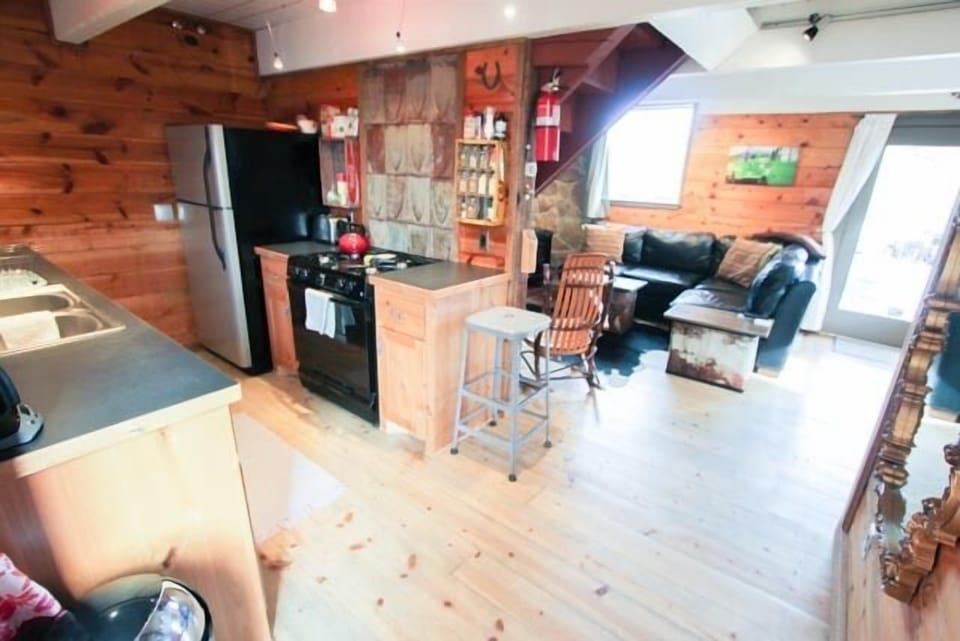 Kitchen, Living room and front door.