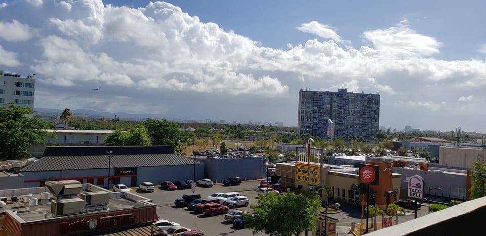 EAST VIEW OF STREET  FROM BALCONY