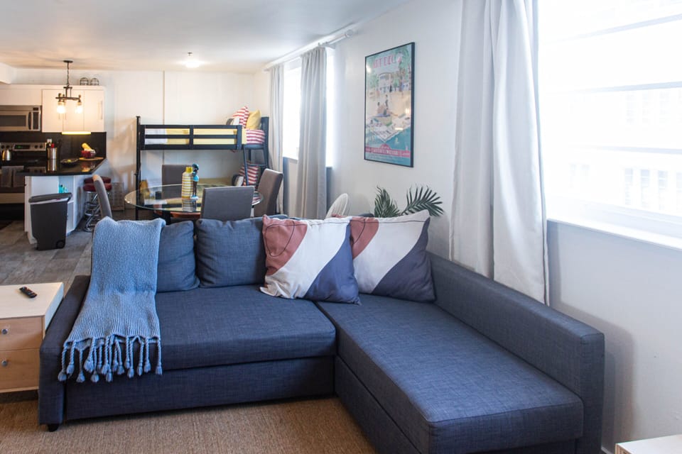 Living room sofa pulls out to a queen size bed.