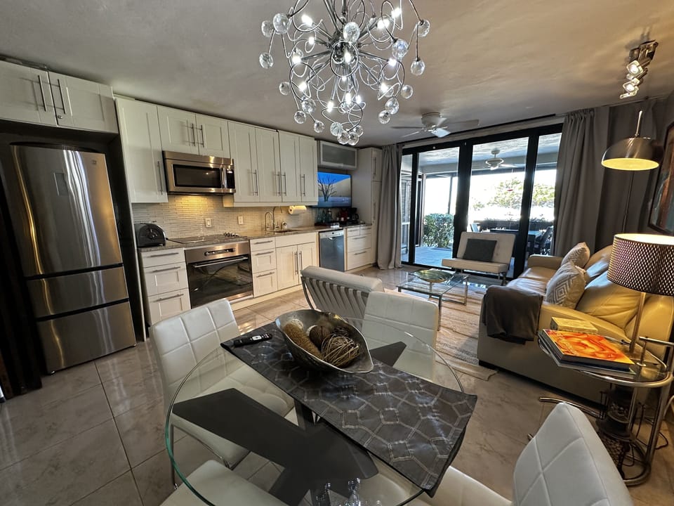 Dining table with kitchen.