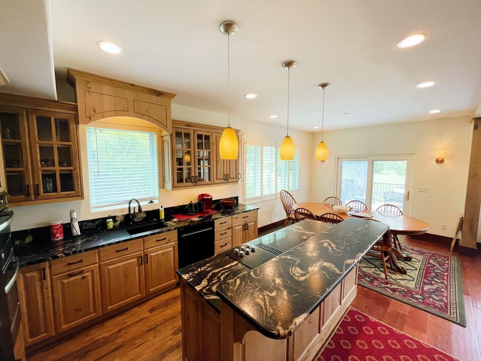 New kitchen 2025 with seating for 3 at raised bar.