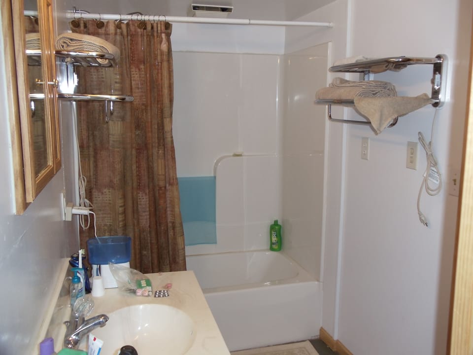 Bath with tub and shower