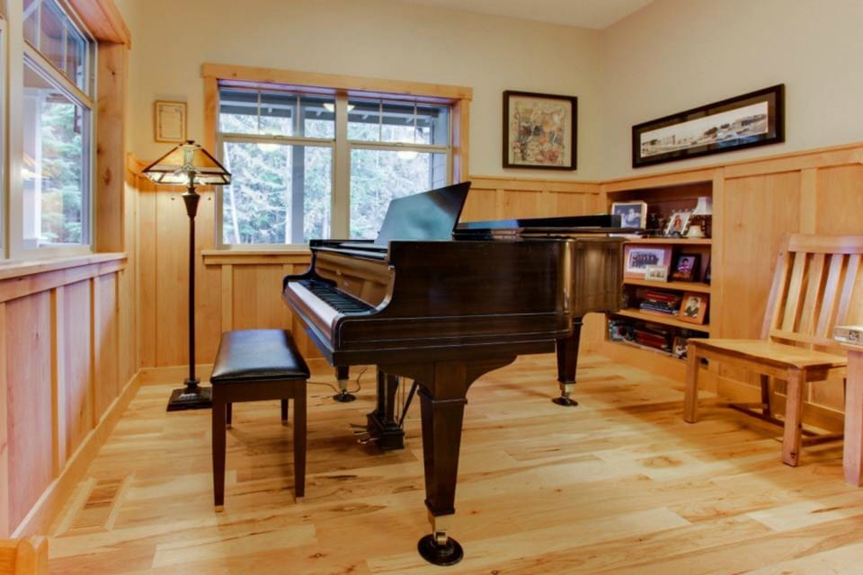 The piano room featuring a beautiful 1934 Baldwin 