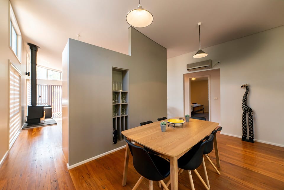 Elegant dining: Spacious table, six comfy chairs. Ideal for shared meals and conversations.