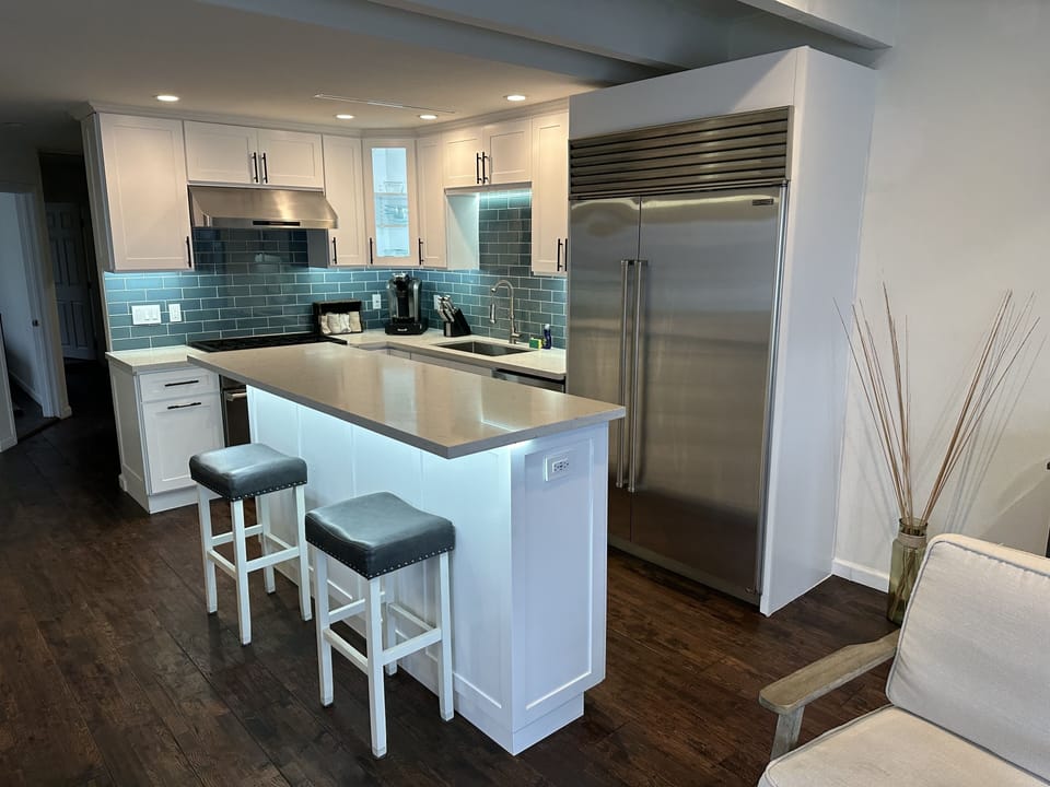 48" Subzero Fridge, Bosch Dishwasher, 36" Wolf Duel Fuel Range.