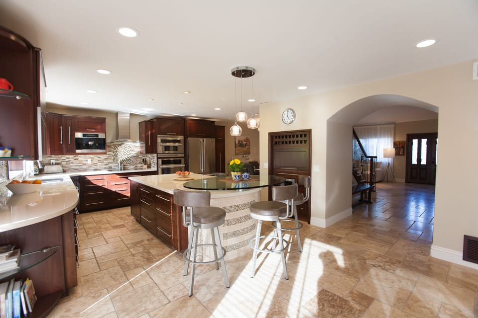 Open floor plan with a fully stocked, gorgeous kitchen. Large kitchen island